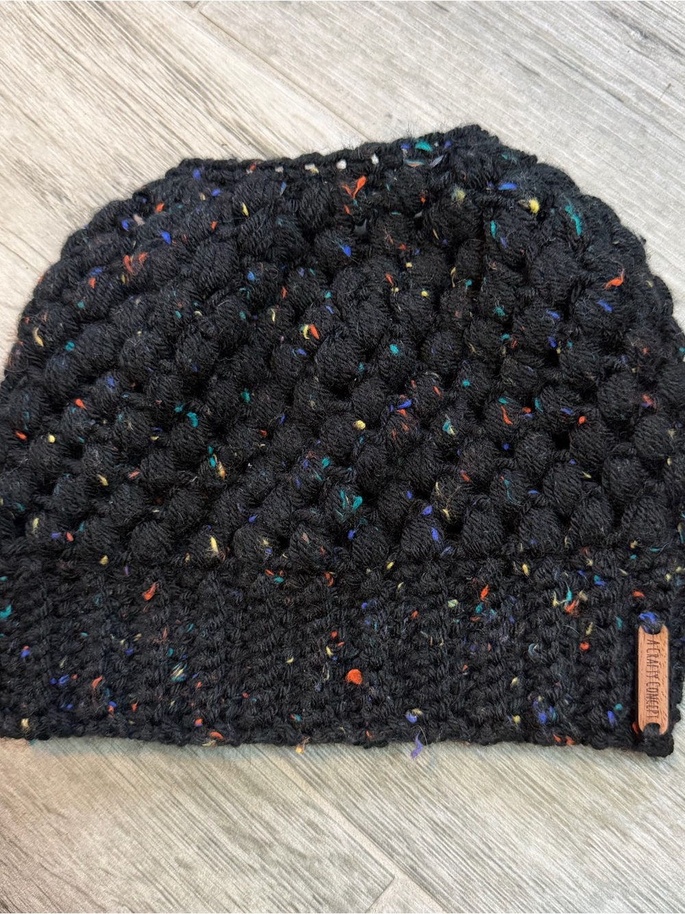 Handmade Black Speckled Crochet Beanie with Ponytail Opening Soft & Cozy